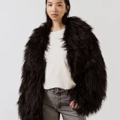 The Black Fluffy Jacket -Mikuta Store mikuta black fluffy jacket grey cropped straight jeans model lisa 3 scaled