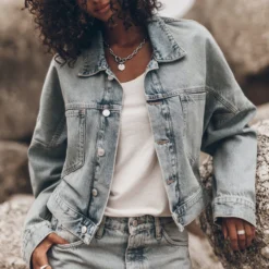 The Blue Cropped Denim Jacket -Mikuta Store mikuta blue cropped denim jacket blue baggy jeans black studded leather sandals emma a SS25 7615 scaled