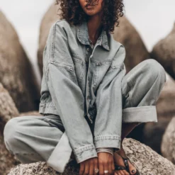 The Blue Cropped Denim Jacket -Mikuta Store mikuta blue cropped denim jacket blue baggy jeans black studded leather sandals emma a ss25 7669 scaled