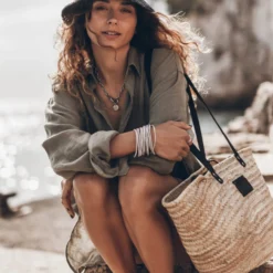 The Black Raffia Bucket Hat 11 The Black Raffia Bucket Hat -Mikuta Store mikuta khaki linen shirt large raffia basket bag model aina 1498 scaled