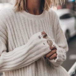 The Off White Destroyed Knitted Sweater -Mikuta Store mikuta off white destroyed knitted sweater silver coated leather skirt black biker boots 8383 d126f9d5 2e4d 4f5e a5a5 4eddd2141f7d scaled