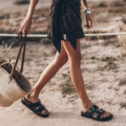 The Black Leather Buckle Sandals -Mikuta Store mikuta printed black wrap dress model aina 1446 f1afac5d 980a 4484 aa69 7389444c6530 scaled