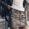 The Silver Coated Leather Skirt 2 The Silver Coated Leather Skirt -Mikuta Store mikuta silver coated leather skirt off white vintage unisex t shirt leather jacket 2647 scaled
