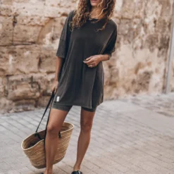 The Dark Faded Short Loose T-Shirt Dress -Mikuta Store mikuta the dark faded short loose t shirt dress the dark faded base biker shorts the black leather buckle sandals the large raffia basket bag aina b SS25 0233 scaled