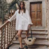 The White Cotton Shirt Dress 2 The White Cotton Shirt Dress -Mikuta Store mikuta the white cotton shirt dress the small cesta bag the black leather buckle sandals myriam t SS25 04 scaled