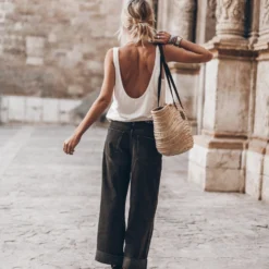 The White Low Back Base Tank Top -Mikuta Store mikuta the white low back base tank top the black baggy jeans the studded belt the large cesta bag the black strappy leather sandals 9067 scaled