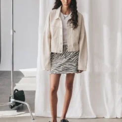 The Zebra Denim Skirt 15 The Zebra Denim Skirt -Mikuta Store mikuta white cropped denim jacket zebra denim skirt white standard tank top black leather buckle sandals aya f SS25 2551 1 scaled