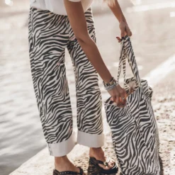 The Zebra Baggy Jeans -Mikuta Store mikuta zebra baggy jeans white regular cotton t shirt black studded leather sandals zebra large canvas bag 0036 12fd41e9 82b1 49c7 b04d 2339095ac997 scaled